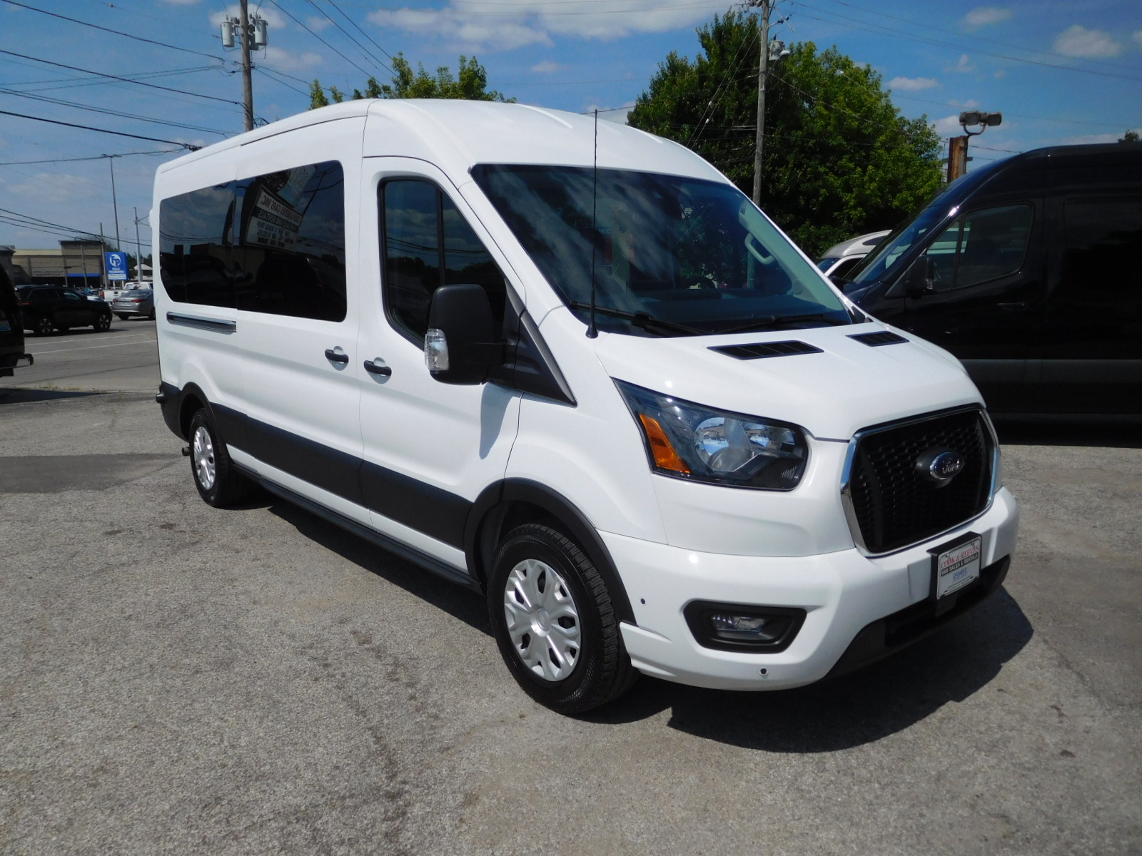 2024 Ford Transit 350 XLT Med Roof Sliding Pass. 148's photo